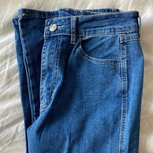 DAZY Slant Pocket Flare Leg Jeans. Medium wash. Size 2.